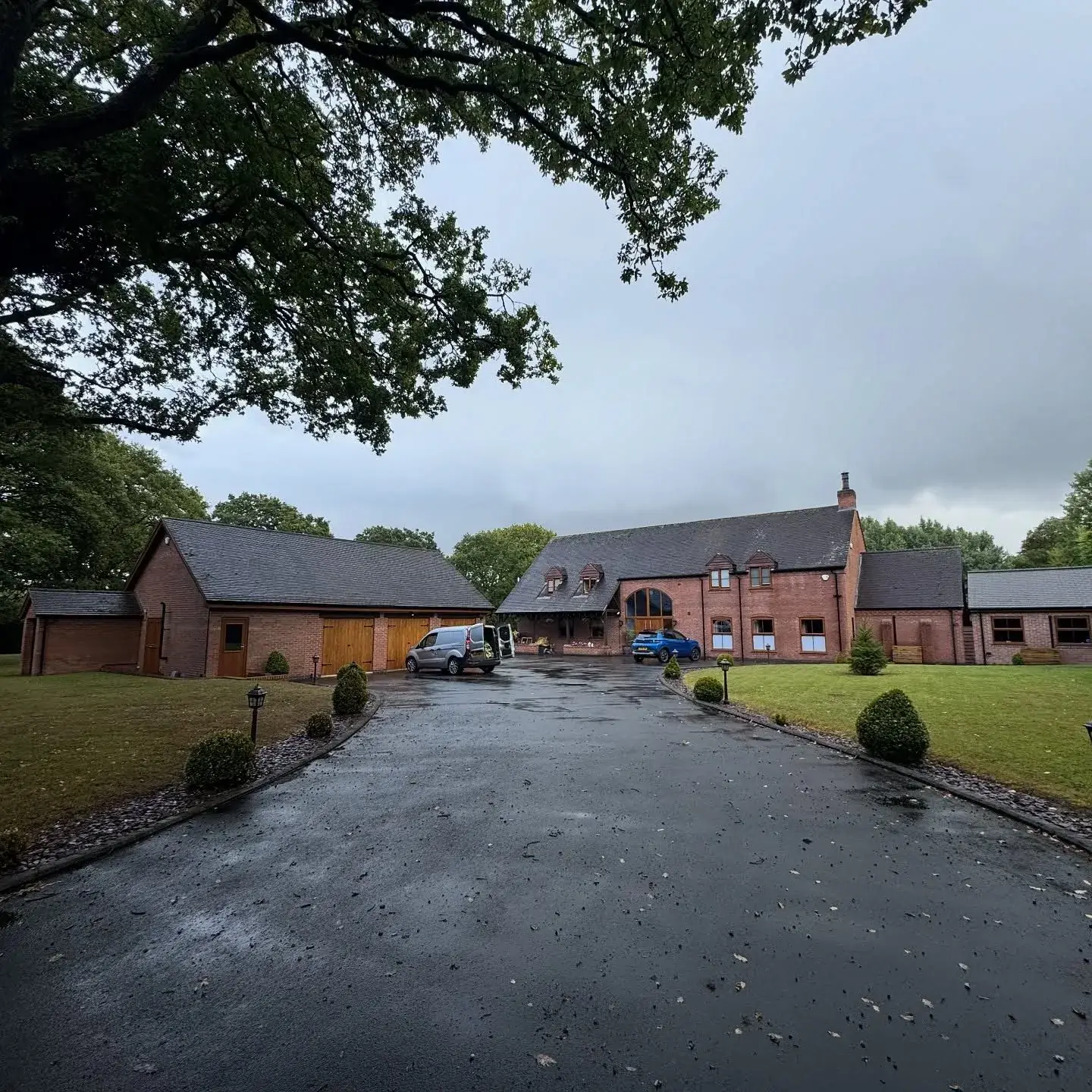 Well-kept lawns and driveway grounds at a Solihull property